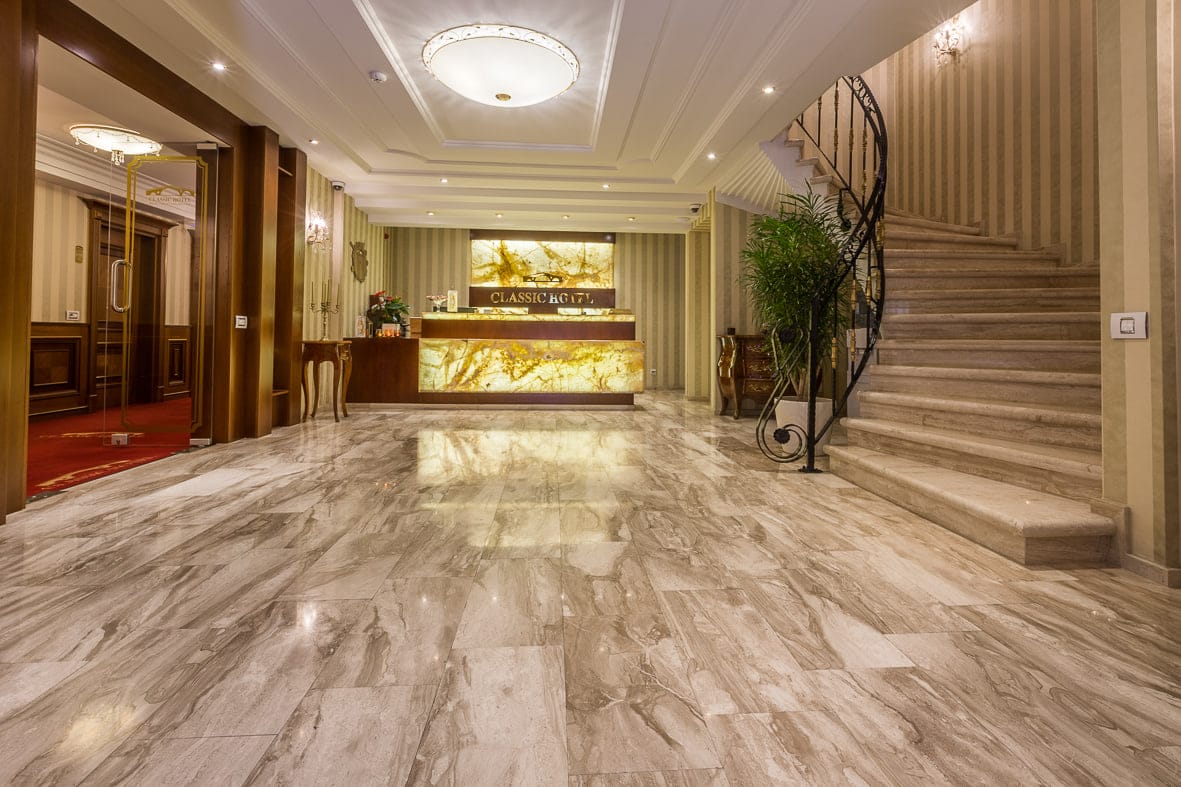 The lobby hall leading to the marble staircase