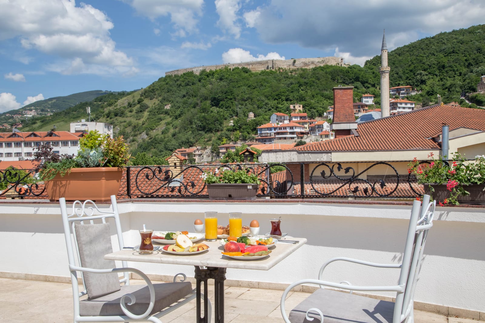 Breakfast on the rooftop terrace with views of Prizren Fortress and the Sinan Pasha minaret